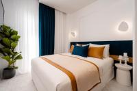 Posteľ alebo postele v izbe v ubytovaní Margaret Luxury Suites