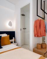 Posteľ alebo postele v izbe v ubytovaní Margaret Luxury Suites