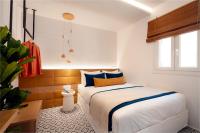 Posteľ alebo postele v izbe v ubytovaní Margaret Luxury Suites