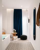 Posteľ alebo postele v izbe v ubytovaní Margaret Luxury Suites