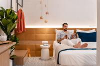 Posteľ alebo postele v izbe v ubytovaní Margaret Luxury Suites