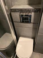 Łazienka w obiekcie Bel appartement avec emplacement idéal