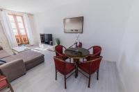 Televízia a/alebo spoločenská miestnosť v ubytovaní A1 - spacious apt on the seafront with terrace