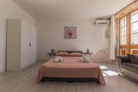 Posteľ alebo postele v izbe v ubytovaní A1 - spacious apt on the seafront with terrace