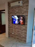 TV a/nebo společenská místnost v ubytování Excellent Appartement aux Berges du Lac2 TUNIS