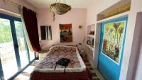 Postel nebo postele na pokoji v ubytování Rural Guest House فندق البيت الريفي