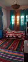 Postel nebo postele na pokoji v ubytování Rural Guest House فندق البيت الريفي
