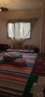 Postel nebo postele na pokoji v ubytování Rural Guest House فندق البيت الريفي