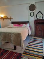 Postel nebo postele na pokoji v ubytování Rural Guest House فندق البيت الريفي