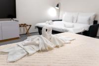 Postel nebo postele na pokoji v ubytování Hotel Smetanova