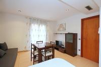 Televízia a/alebo spoločenská miestnosť v ubytovaní Apartamento Velvet