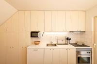 Kuchyň nebo kuchyňský kout v ubytování Casa 128 by LovelyStay