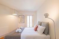 Postel nebo postele na pokoji v ubytování Casa 128 by LovelyStay