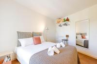 Postel nebo postele na pokoji v ubytování Casa 128 by LovelyStay