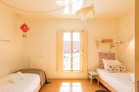 Postel nebo postele na pokoji v ubytování Casa 128 by LovelyStay