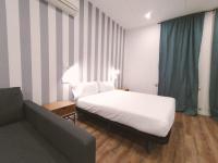 Postel nebo postele na pokoji v ubytování Apartamentos Margarita by gaiarooms