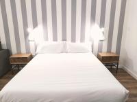 Postel nebo postele na pokoji v ubytování Apartamentos Margarita by gaiarooms