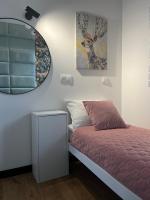 Postel nebo postele na pokoji v ubytování Apartamenty Maxa Czornyja