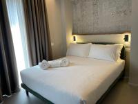Villa Clementina Boutique Hotelにあるベッド