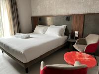 Villa Clementina Boutique Hotelにあるベッド