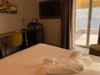 Villa Clementina Boutique Hotelにあるベッド