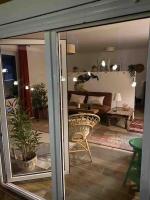 a view of a living room through a glass window at Studio provençal atypique avec jacuzzi privé in Sanary-sur-Mer