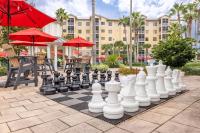 a giant chessboard on a patio at a resort at Marriott&#39;s Legends Edge at Bay Point in Panama City Beach