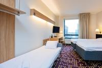 Dorpat Hotelにあるベッド