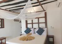 Jaribu Beach Hotelにあるベッド