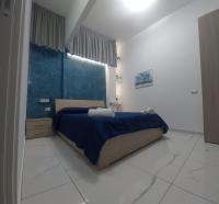 Łóżko lub łóżka w pokoju w obiekcie Stabia Dream Rooms