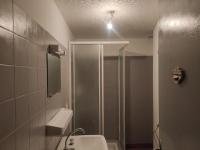 a bathroom with a shower and a sink at Petite maison de village in Puylaurens