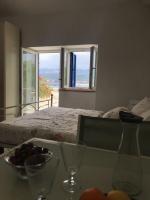 Posteľ alebo postele v izbe v ubytovaní Apartments Dunato Nedeljko