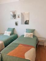 Posteľ alebo postele v izbe v ubytovaní Appartement chaleureux au centre du village