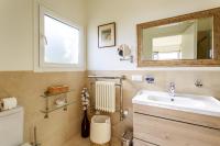 a bathroom with a sink and a mirror at Sea terace apartment between Nice and Monaco - 3 in Villefranche-sur-Mer