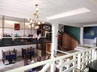 En restaurant eller et andet spisested på Treenz Lite