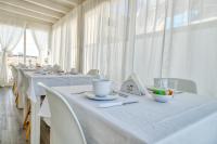 Reštaurácia alebo iné gastronomické zariadenie v ubytovaní ILICE B&B