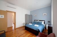 Postel nebo postele na pokoji v ubytování Lisboa Sweet Family Homestay