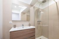 a bathroom with a sink and a shower at Superbe T2 Juan Les Pins 300m des plages in Antibes