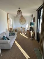 Część wypoczynkowa w obiekcie Les Cottages de Carine