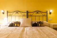Postel nebo postele na pokoji v ubytování Apartamentos Casona del Campo