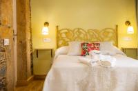 Postel nebo postele na pokoji v ubytování Apartamentos Casona del Campo