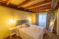 Postel nebo postele na pokoji v ubytování Apartamentos Casona del Campo