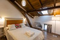 Postel nebo postele na pokoji v ubytování Apartamentos Casona del Campo