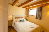 Postel nebo postele na pokoji v ubytování Apartamentos Casona del Campo