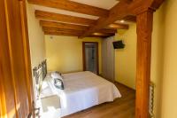 Postel nebo postele na pokoji v ubytování Apartamentos Casona del Campo
