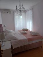 Postel nebo postele na pokoji v ubytování Apartment Vestibul Inn