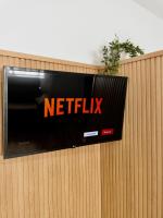 Televízia a/alebo spoločenská miestnosť v ubytovaní Apartamento de Julia
