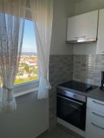 Kuchyňa alebo kuchynka v ubytovaní Apartments Kostelic