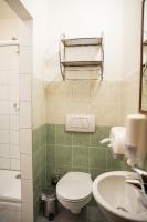 a bathroom with a toilet and a sink at Hostel Little Quarter in Prague