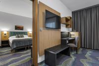 Aurora Hotel at Reykjavik-Keflavik Airport Terminal KEFにあるベッド
